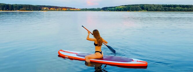 Trip Russland - Wassersport mit Balance & Technik vereinen | Stand up paddeln, SUPen, Surfen, Skiten, Wakeboarden, Wasserski auf kristallklaren Bergseen